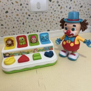 2 brinquedos Push Pop e Palhaço dançante